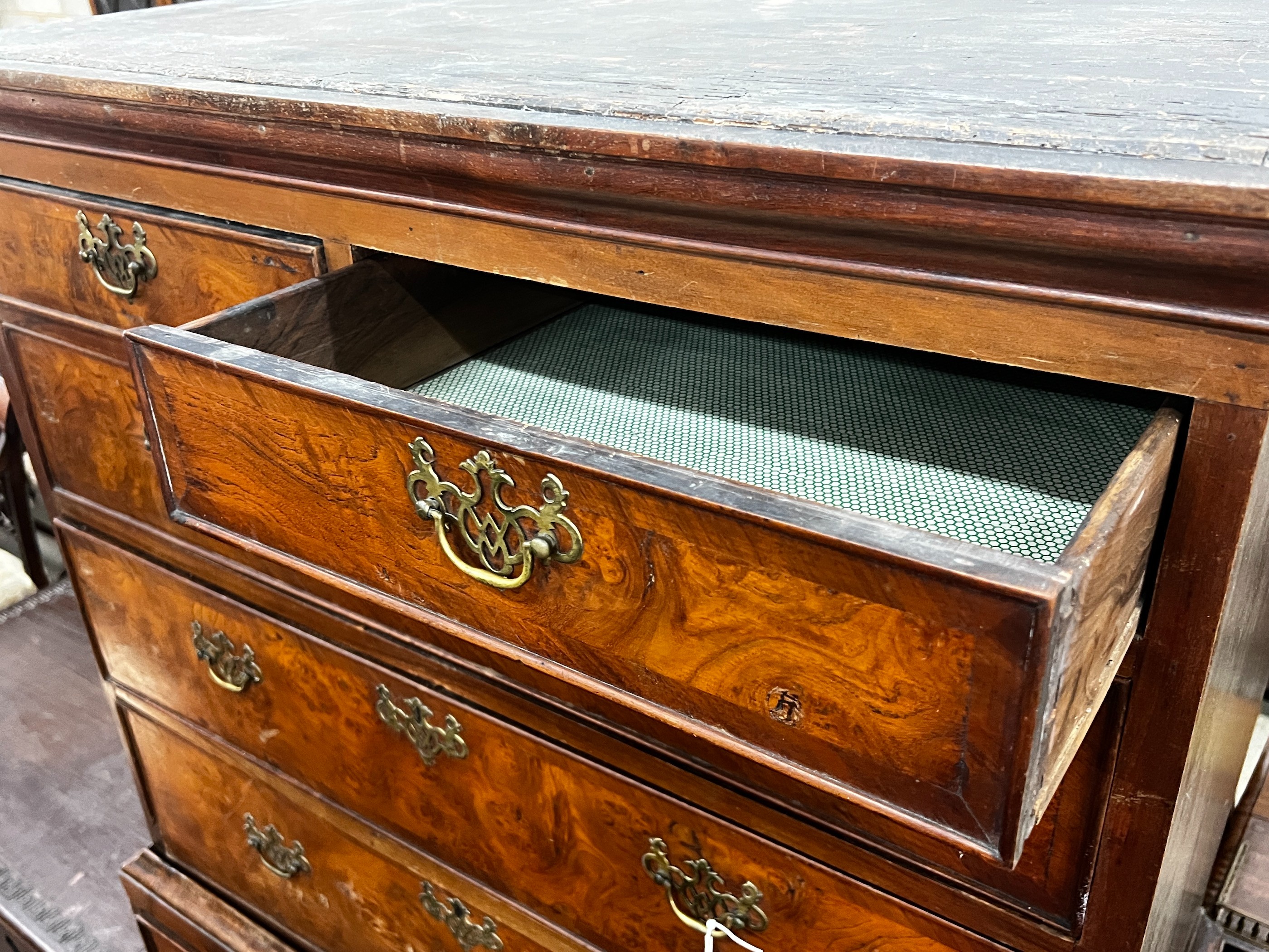 A George III banded burr elm tallboy, width 100cm, depth 53cm, height 168cm